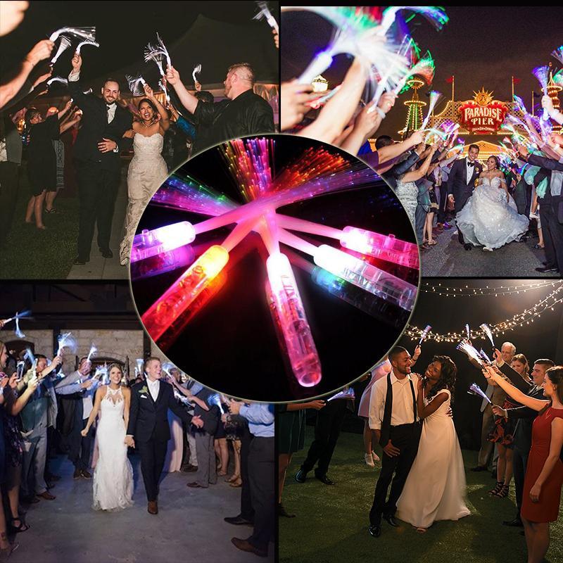 Wedding Glow Stick Send Off with a Wood Backdrop Stock Photo